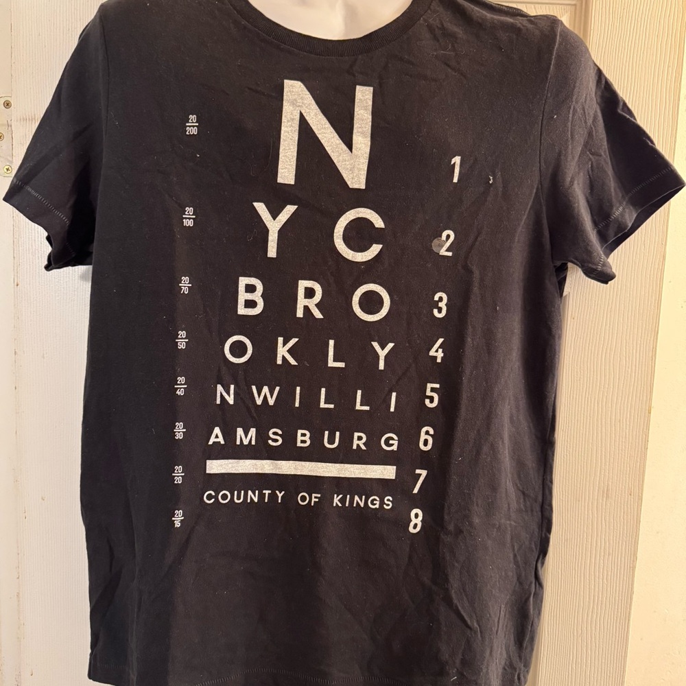 Aeropostale Black Short Sleeve Tee with Eye Chart Design